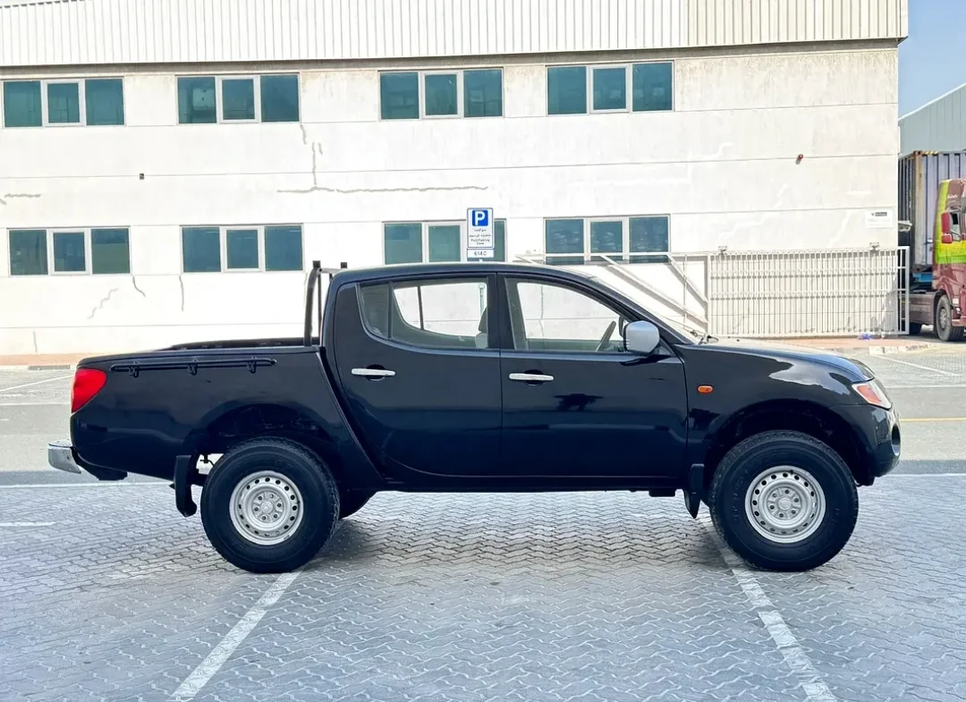 Mitsubishi L200 2009 — miniature 5