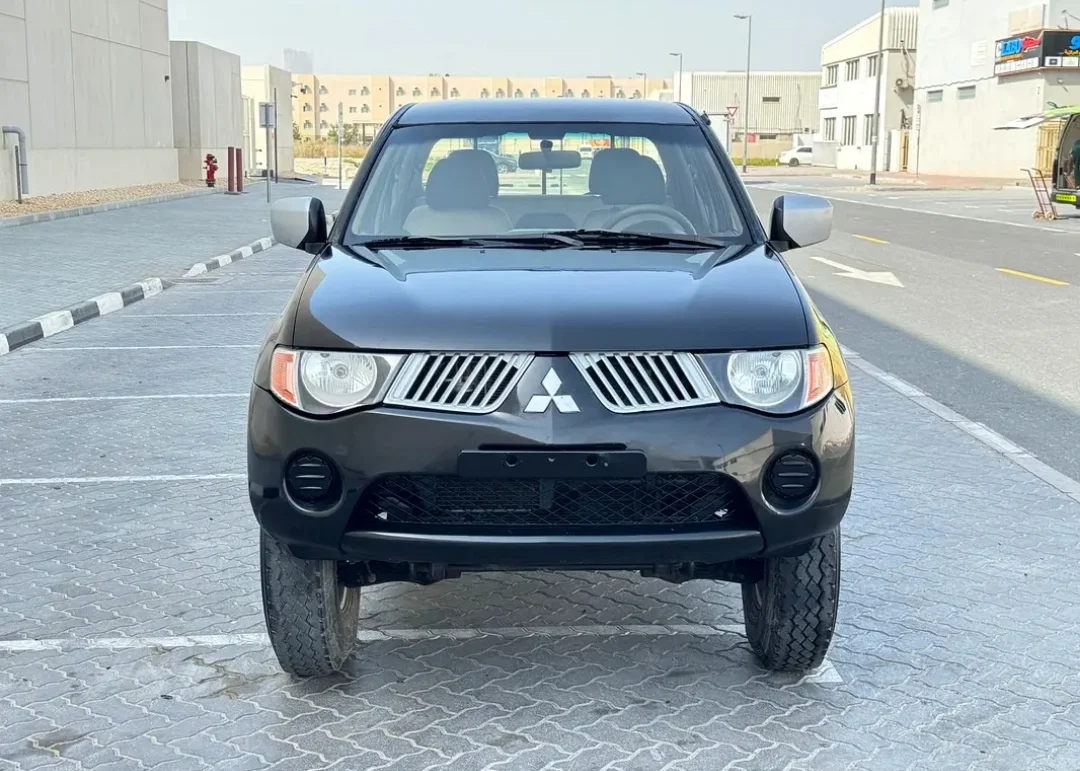 Mitsubishi L200 2009 — photo principale