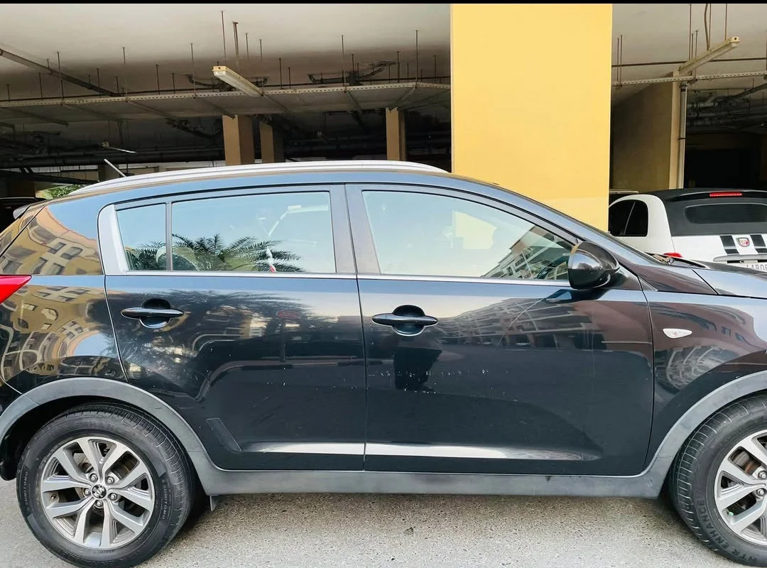 KIA Sportage 2015 — miniature 4