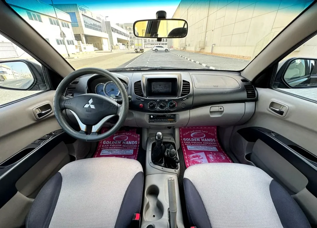 Mitsubishi L200 2009 — miniature 4