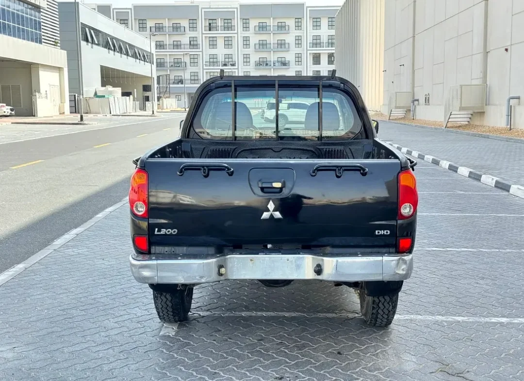 Mitsubishi L200 2009 — miniature 7